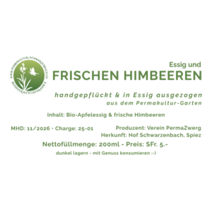 Essig mit frischen Himbeeren